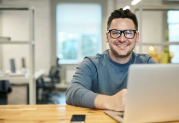 photo of man wearing eyeglasses