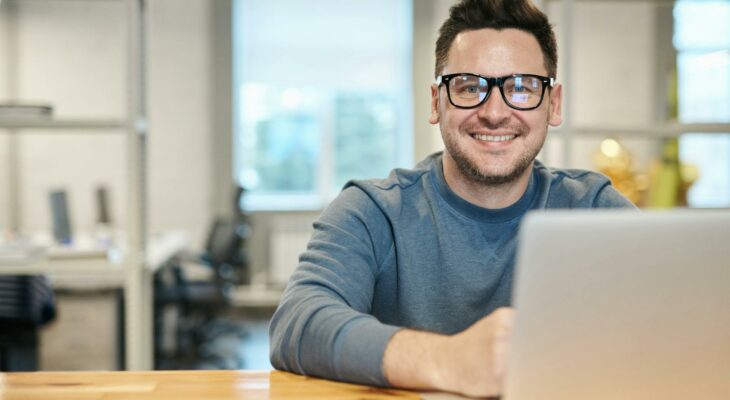 photo of man wearing eyeglasses